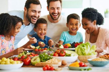 A joyful family of five sitting around a dinner table, enjoying an array of colorful, nutritious dishes, fostering an atmosphere of love and togetherness during mealtime.