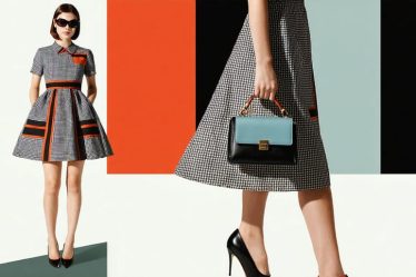 A model in a contemporary interpretation of a 1960s A-line dress with geometric patterns, accessorized with oversized sunglasses and a structured handbag, blending vintage elements with modern fashion.